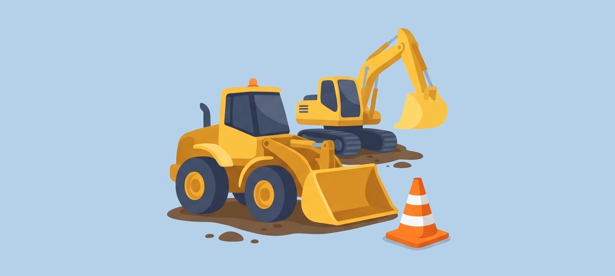 Heavy earthmoving wheel loader and crawler excavator operating on infrastructure site